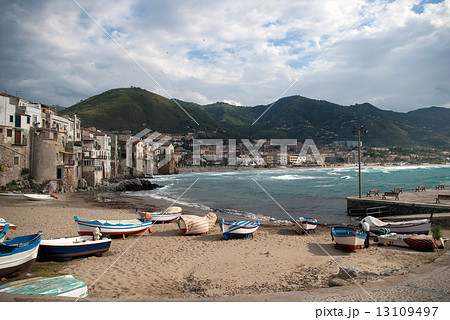 Beach in Cefalu, popular touristic village at the island of Sici 13109497