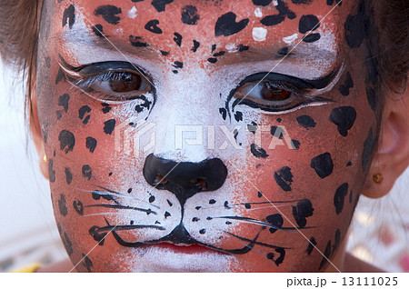 cute girl kid face with painted panther color mask 13111025