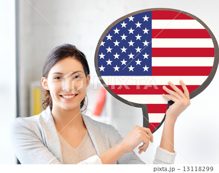 smiling woman with text bubble of american flag smiling woman with text bubble of american flag 13118299