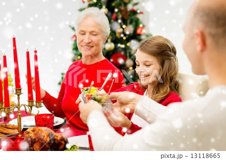 smiling family having holiday dinner at home smiling family having holiday dinner at home 13118665