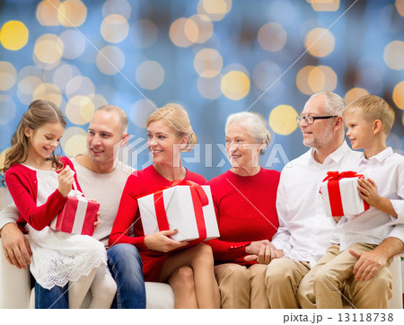 smiling family with gifts 13118738