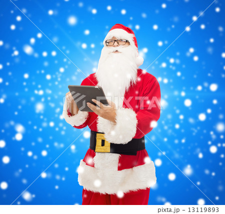 man in costume of santa claus with tablet pc man in costume of santa claus with tablet pc 13119893