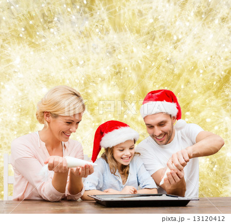 happy family in santa helper hats cooking happy family in santa helper hats cooking 13120412