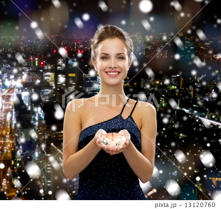 smiling woman in evening dress with diamond 13120760