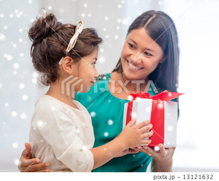 happy mother and child girl with gift box 13121632