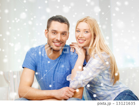happy couple hugging at home 13121635