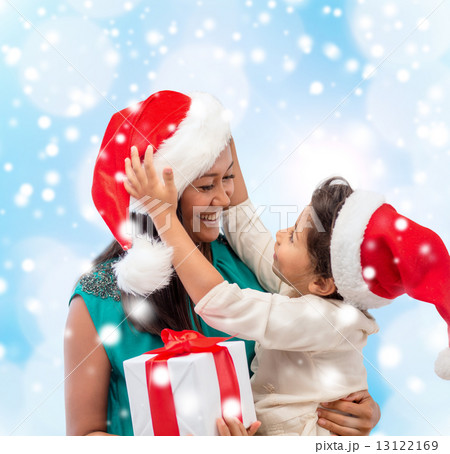 happy mother and child girl with gift box 13122169