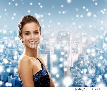smiling woman in evening dress 13122199