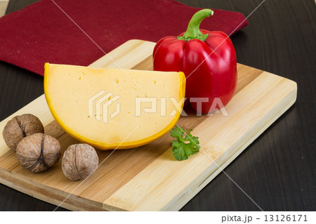 Yellow round cheese 13126171