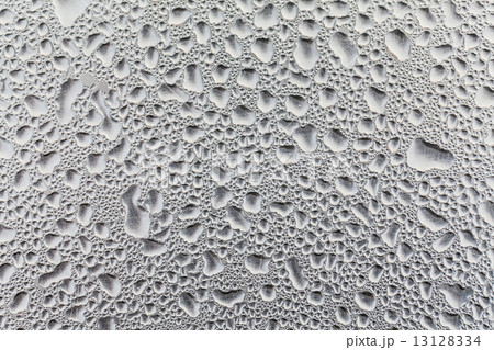 Metal surface covered in water drops. Metal surface covered in water drops. 13128334