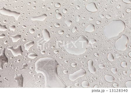 Metal surface covered in water drops. Metal surface covered in water drops. 13128340