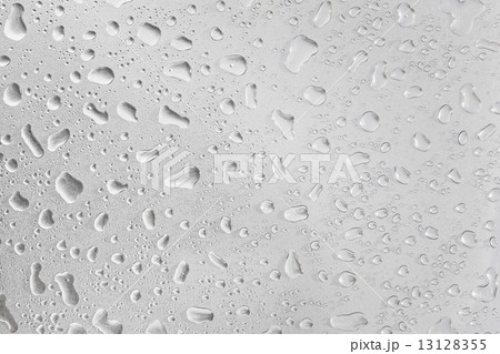 Metal surface covered in water drops. Metal surface covered in water drops. 13128355
