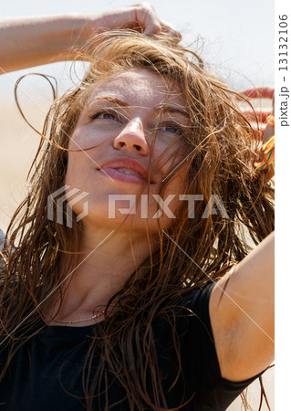 Young woman smiling 13132106
