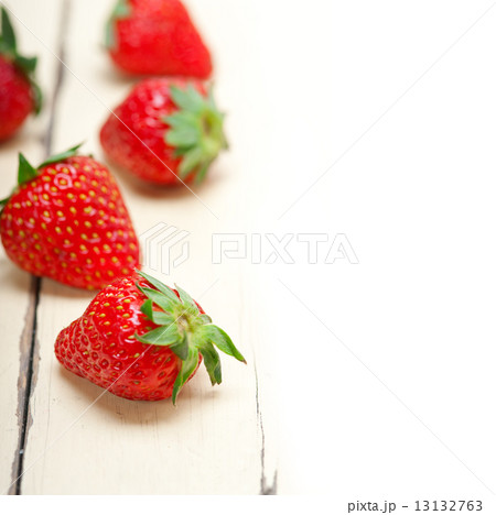 fresh organic strawberry over white wood fresh organic strawberry over white wood 13132763