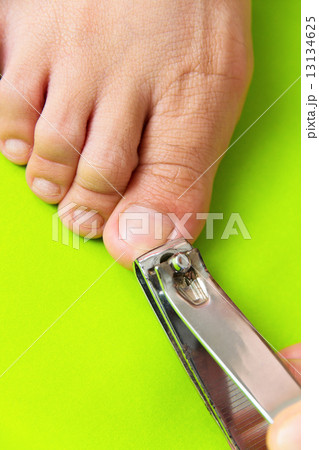 Cutting your toenails concept  13134625