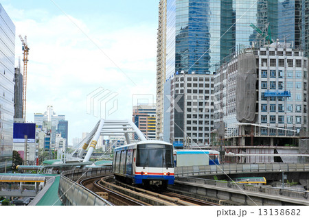 Sky train in Bangkok with business building 13138682
