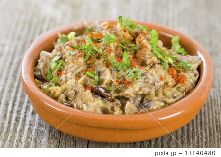 Aubergine Dip - Spanish tapas dish with grilled aubergine, garlic and olive oil garnished with parsl Aubergine Dip - Spanish tapas dish with grilled aubergine, garlic and olive oil garnished with parsl 13140480