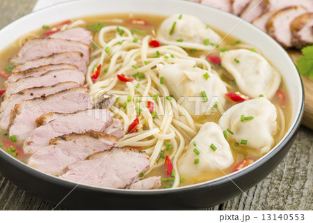 Wonton Noodle Soup - Chinese noodle soup with dumplings and sliced duck breast. 13140553