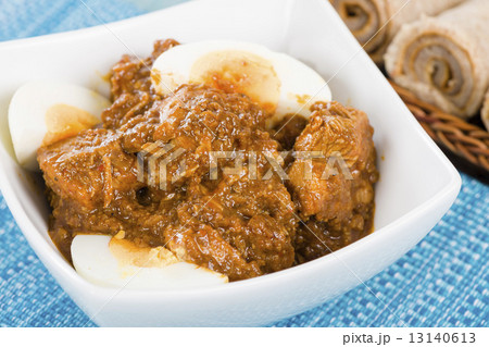 Doro Wat - Ethiopian red chicken stew cooked with onions and berbere (chili and spices mix) 13140613