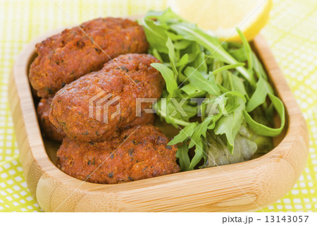Koftas - Asian style meatballs served with salad and pita bread, chili sauce and yoghurt. 13143057