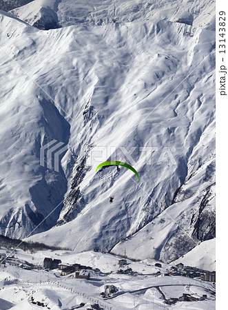 Speed flying in snow mountains at sun day 13143829