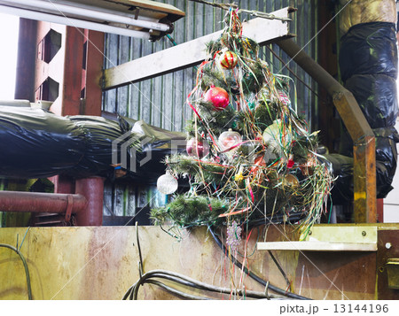 old decorated Christmas tree in workshop old decorated Christmas tree in workshop 13144196