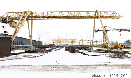 landscape with bridge cranes and metal products 13144263