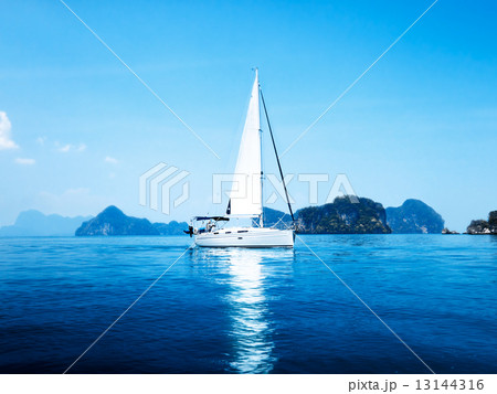 yacht and blue water ocean 13144316