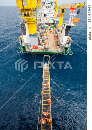 Large crane vessel installing the platform in offshore 13146946