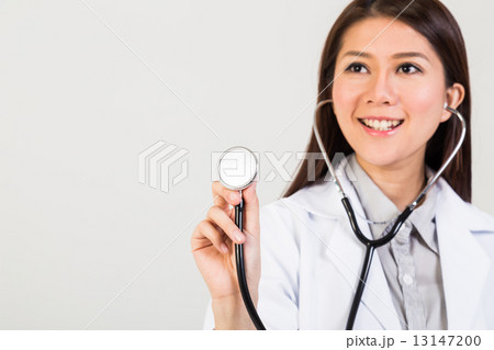 Female doctor with focus on the stethoscope  13147200