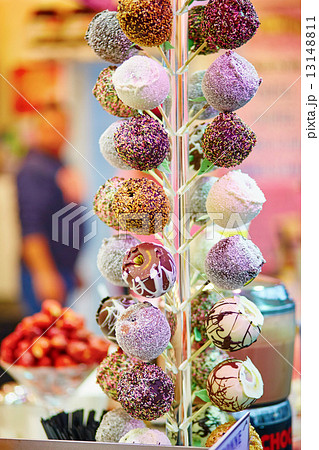 Apples in chocolate icing on a Christmas market 13148811