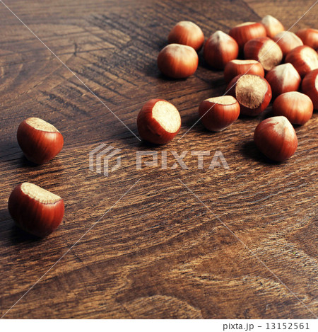 Hazelnuts on wood background 13152561