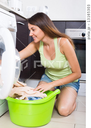 Woman with linen basket Woman with linen basket 13165303