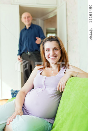 Happy pregnant couple 13165490