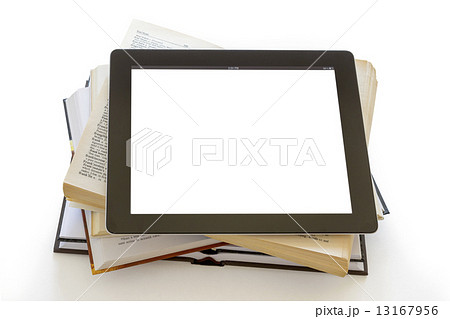 Open Books and digital tablet pc with blank screen concept 13167956