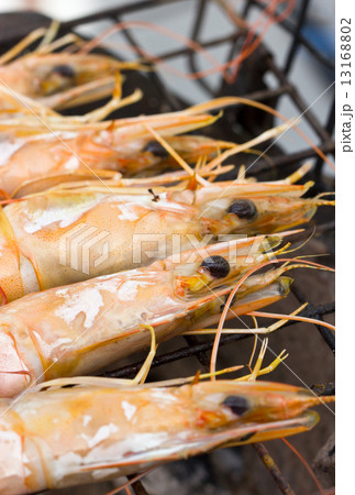 Close up of Grilled Shrimps on Stove. 13168802
