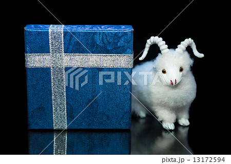 Goat or sheep with gift box Goat or sheep with gift box 13172594