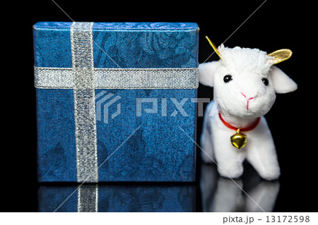Goat or sheep with gift box 13172598