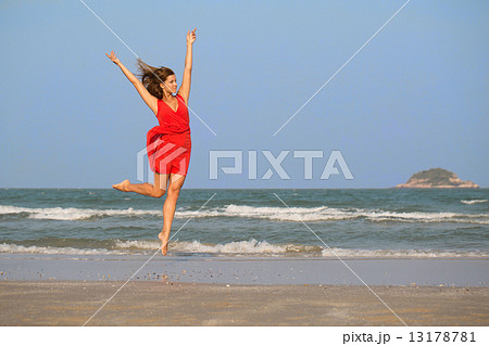 Beauty redhead girl jumping 13178781
