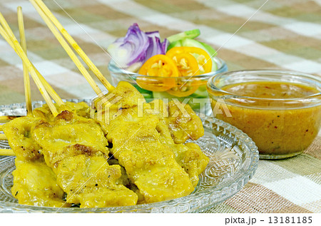 Indonesian Satay with peanut sauce and pickled vegetable. Indonesian Satay with peanut sauce and pickled vegetable. 13181185