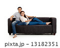 Asian Couple on Couch in White Background Asian Couple on Couch in White Background 13182351