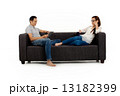 Asian Couple on Couch in White Background Asian Couple on Couch in White Background 13182399