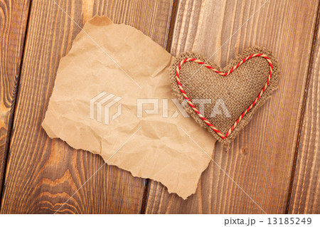 Valentines toy heart and piece of paper for copy space 13185249