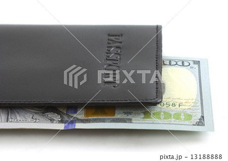 US dollars in passport on white background 13188888