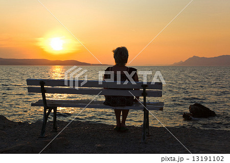 Woman and sunset 13191102