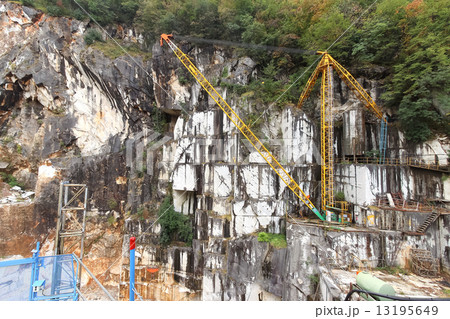 Marble mine in rainy season in Carrara, Italy. 13195649