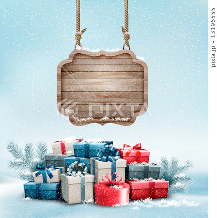 Christmas background with a retro wooden sign and gift boxes. Ve 13196555