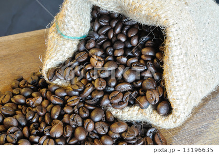 Close up many coffee seeds in bag. Close up many coffee seeds in bag. 13196635