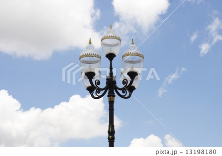 antique lamp post on blue sky antique lamp post on blue sky 13198180