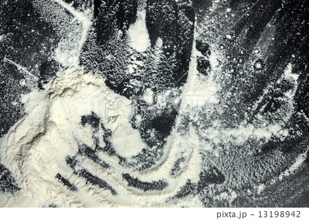White flour on black background White flour on black background 13198942